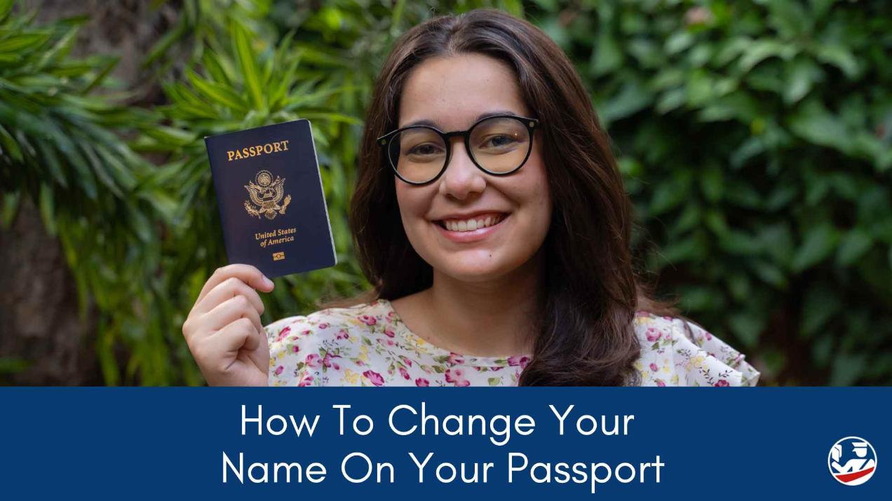 A woman smiles as she holds her newly-issued, passport following a name change