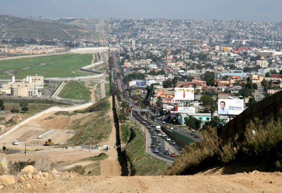A hillside view of the US Mexico border